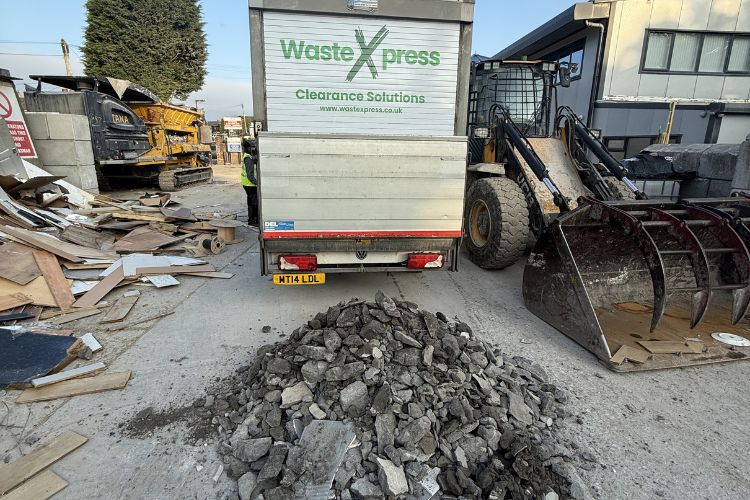 Construction rubble collected and loaded by WasteXpress at a Manchester site
