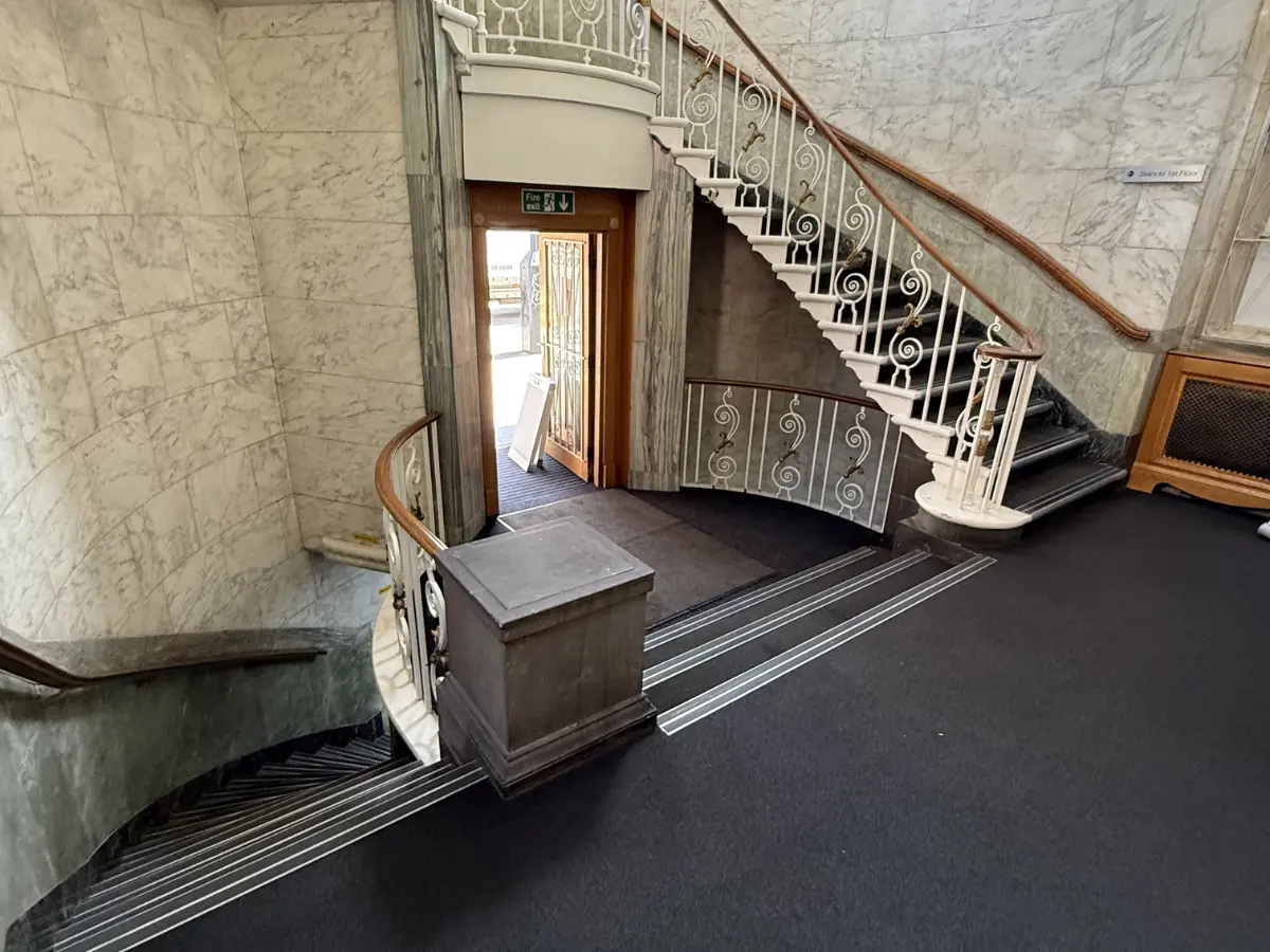 Clean communal entrance and staircase after a professional house clearance, leaving the property ready for sale, letting or renovation.